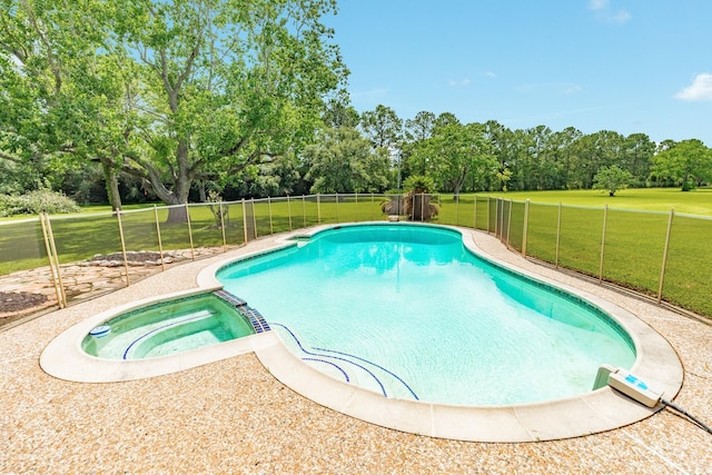 3003 Sky Ranch Dr, Alvin, TX 77511 - view of swimming pool featuring view of wooded area and a pool with connected hot tub
