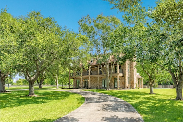 3003 Sky Ranch Dr, Alvin, TX 77511 - view of community with a lawn