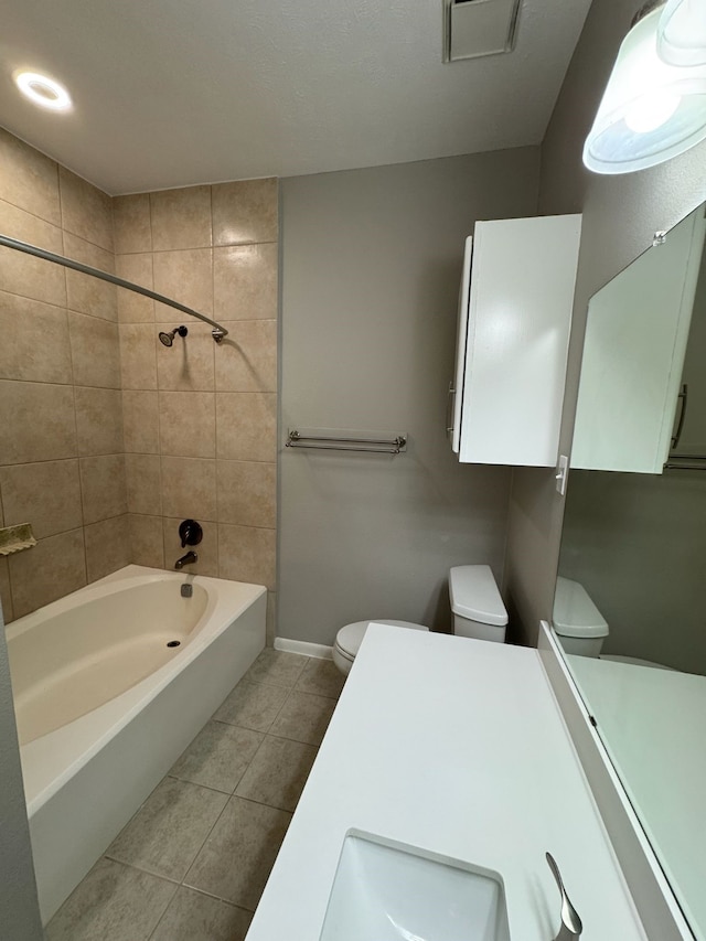 2011 Spenwick Dr Unit 513, Houston, TX 77055 - full bath with toilet, tile patterned floors, shower / bath combination, baseboards, and vanity