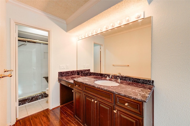14171 Misty Meadow Ln, Houston, TX 77079 - full bathroom featuring vanity, ornamental molding, toilet, a shower, and wood finished floors