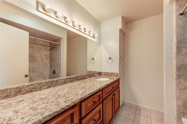 14171 Misty Meadow Ln, Houston, TX 77079 - full bath with vanity, tile patterned flooring, tiled shower, and baseboards