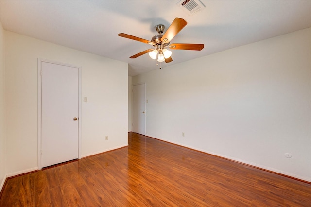 14171 Misty Meadow Ln, Houston, TX 77079 - unfurnished room with wood finished floors, a ceiling fan, and baseboards