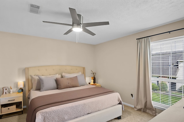 12250 Beamer Rd, Houston, TX 77089 - bedroom with light colored carpet, a ceiling fan, and baseboards