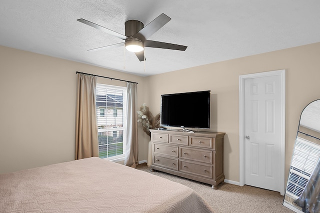 12250 Beamer Rd, Houston, TX 77089 - bedroom featuring light carpet, ceiling fan, and baseboards