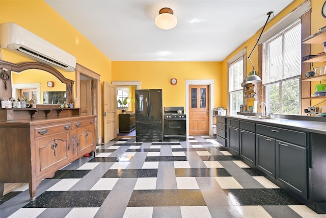 2215 30th St, Galveston, TX 77550 - full bathroom with a wall unit AC, vanity, and tile patterned floors
