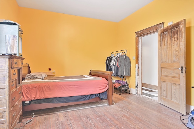 2215 30th St, Galveston, TX 77550 - bedroom with wood finished floors