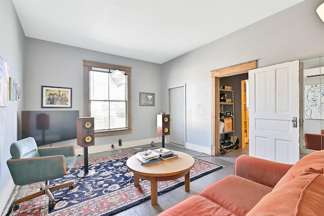 2215 30th St, Galveston, TX 77550 - living area featuring wood finished floors and baseboards