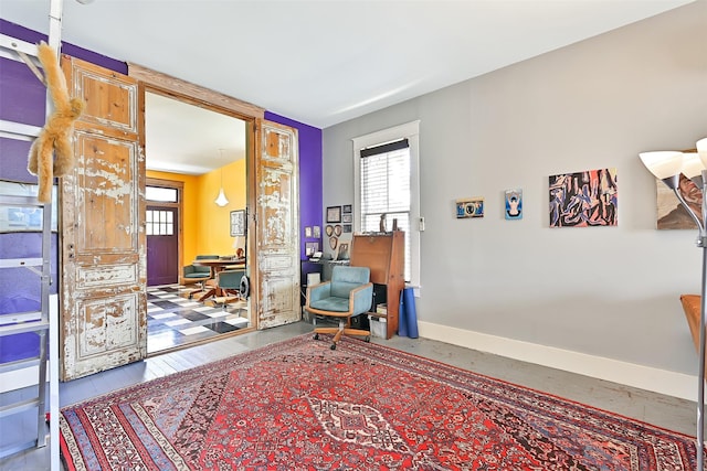 2215 30th St, Galveston, TX 77550 - sitting room with plenty of natural light, baseboards, and a desk