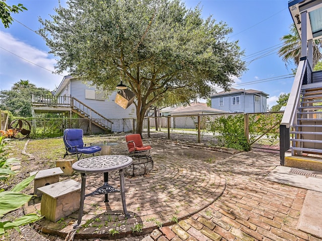2215 30th St, Galveston, TX 77550 - view of patio featuring stairway