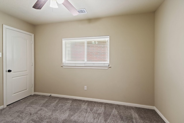 9115 E Lakeside Dr, Magnolia, TX 77354 - unfurnished bedroom with carpet flooring, baseboards, and a ceiling fan