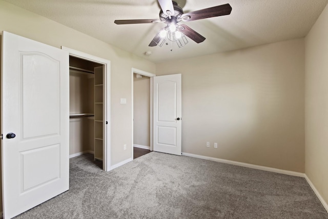 9115 E Lakeside Dr, Magnolia, TX 77354 - unfurnished bedroom featuring carpet floors, a closet, baseboards, and ceiling fan