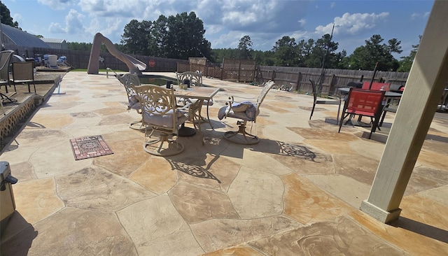 1560 Fm 355, Groveton, TX 75845 - fenced backyard with outdoor dining space and a patio