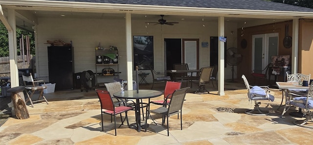 1560 Fm 355, Groveton, TX 75845 - view of patio with outdoor dining space, a ceiling fan, and french doors