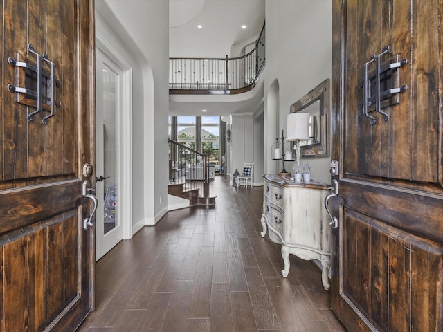 18910 Paddlefish Way, Cypress, TX 77433 - entrance foyer featuring stairs, a high ceiling, dark wood-type flooring, and recessed lighting