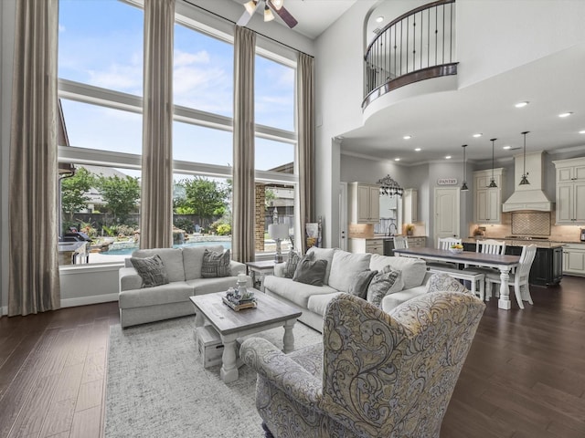18910 Paddlefish Way, Cypress, TX 77433 - living room with a high ceiling, ceiling fan, dark wood-style flooring, and recessed lighting