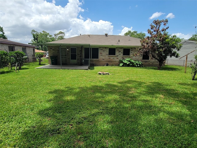 7240 Parker Rd, Houston, TX 77016 - back of house with a patio and brick siding