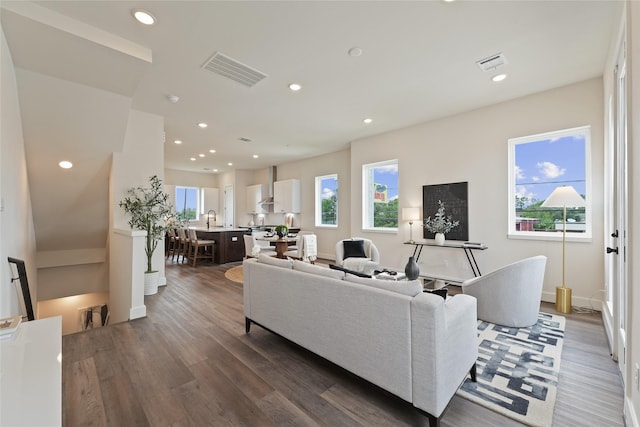 3905 Pinemont Dr Unit G, Houston, TX 77018 - living room with wood finished floors, recessed lighting, and baseboards