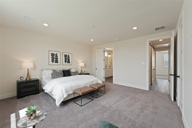 3905 Pinemont Dr Unit G, Houston, TX 77018 - carpeted bedroom with attic access, recessed lighting, baseboards, and connected bathroom