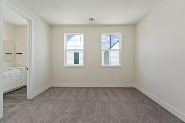 3905 Pinemont Dr Unit G, Houston, TX 77018 - spare room with baseboards and carpet flooring
