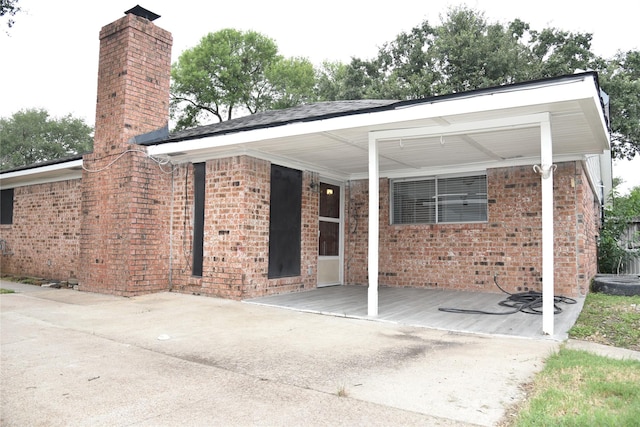 13407 Linden St, Sugar Land, TX 77498 - view of front of property with a chimney and brick siding
