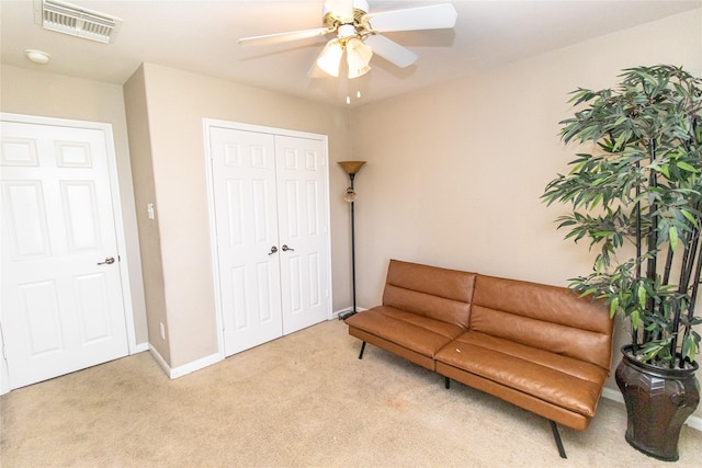 4919 Bentonite Blvd, Baytown, TX 77521 - living area with light colored carpet, a ceiling fan, and baseboards