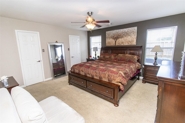 4919 Bentonite Blvd, Baytown, TX 77521 - bedroom featuring light colored carpet and a ceiling fan