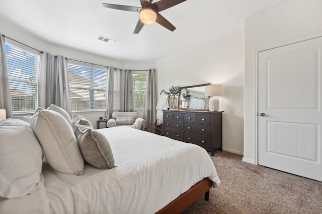 2037 Muggy Ln, Conroe, TX 77301 - carpeted bedroom with baseboards and ceiling fan
