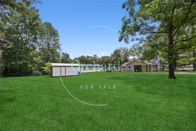 9196 White Oak Dr, Conroe, TX 77384 - view of grassy yard