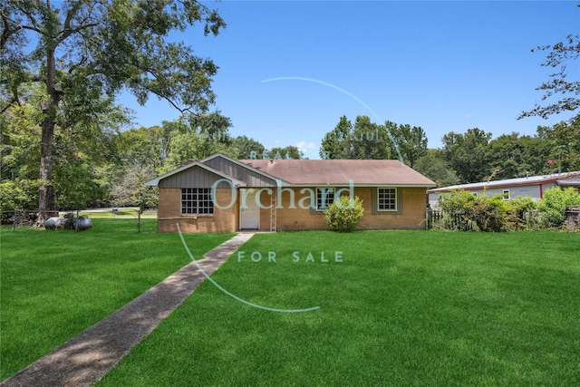 9196 White Oak Dr, Conroe, TX 77384 - single story home with brick siding