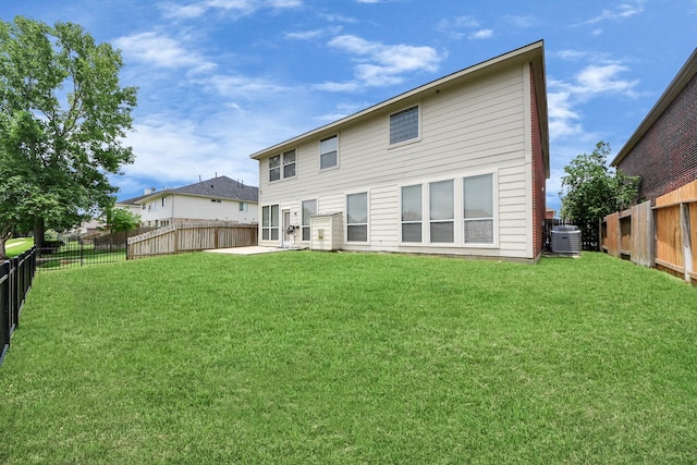 11311 Burmese Ln, Sugar Land, TX 77478 - back of house with central AC unit and a patio
