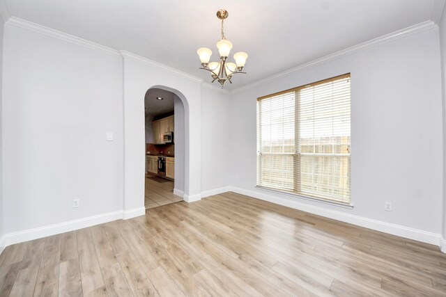 11311 Burmese Ln, Sugar Land, TX 77478 - unfurnished room featuring arched walkways, a chandelier, light wood-style flooring, crown molding, and baseboards