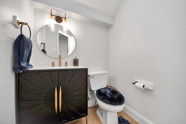 11311 Burmese Ln, Sugar Land, TX 77478 - bathroom with vanity, tile patterned floors, toilet, and baseboards