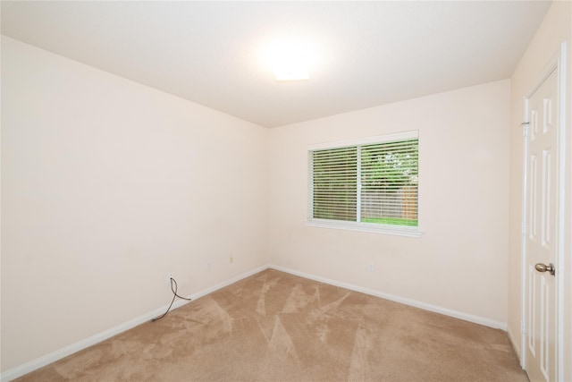 3226 Woodwind Rd, Montgomery, TX 77356 - unfurnished room with light carpet and baseboards