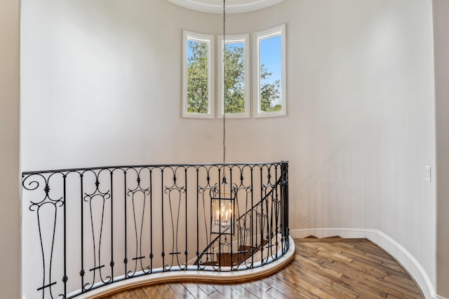 6014 Floyd St, Houston, TX 77007 - staircase with hardwood / wood-style floors and baseboards