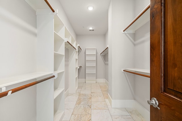 2022 Sabine St, Houston, TX 77007 - spacious closet with light marble finish flooring