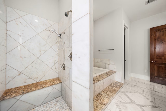 2022 Sabine St, Houston, TX 77007 - bathroom with a garden tub and tiled shower