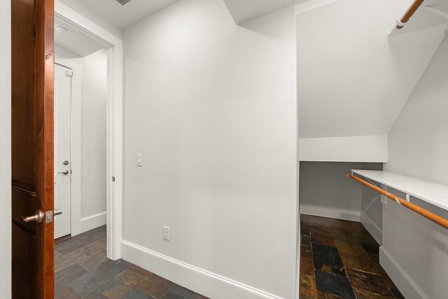 2022 Sabine St, Houston, TX 77007 - spacious closet with stone tile flooring and built in desk