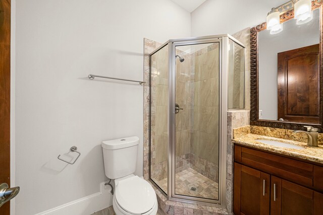 2022 Sabine St, Houston, TX 77007 - bathroom featuring toilet, vanity, and a stall shower
