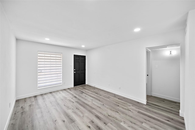 1106 W Tri Oaks Ln Unit 134, Houston, TX 77043 - empty room featuring wood finished floors and recessed lighting