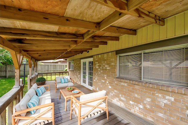 20110 Misty Pines Dr, Humble, TX 77346 - wooden deck with an outdoor living space and french doors