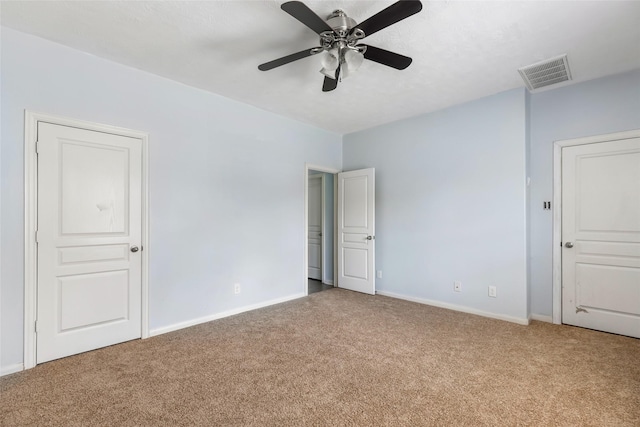 6015 Coleus St, Crosby, TX 77532 - unfurnished bedroom with carpet flooring, baseboards, and a ceiling fan