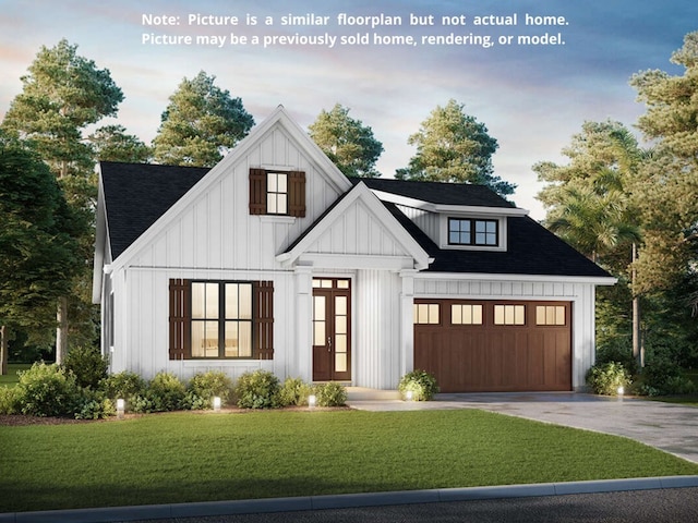 25756 Hickory Ln, Splendora, TX 77372 - modern inspired farmhouse featuring french doors, concrete driveway, a front yard, and board and batten siding