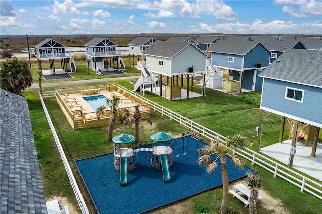 1088 Johnson Rd, Gilchrist, TX 77617 - rear view of property with a residential view and a fenced backyard