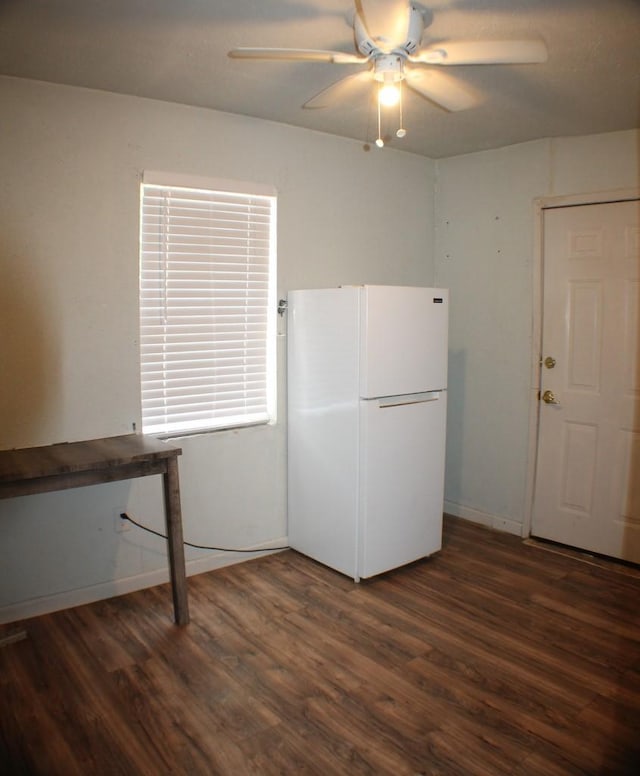 1611 Chapman St, Houston, TX 77009 - kitchen featuring freestanding refrigerator, dark wood-style floors, and a ceiling fan