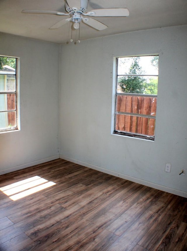 1611 Chapman St, Houston, TX 77009 - spare room with healthy amount of natural light, wood finished floors, and baseboards