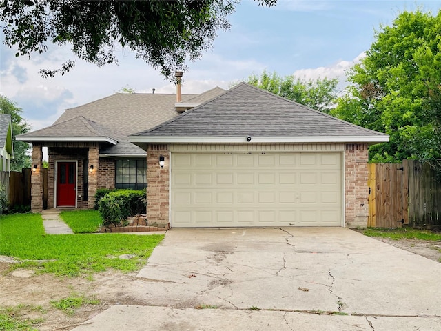 16303 Napa Vine Dr, Houston, TX 77053 - view of front of property featuring a shingled roof, brick siding, concrete driveway, and an attached garage