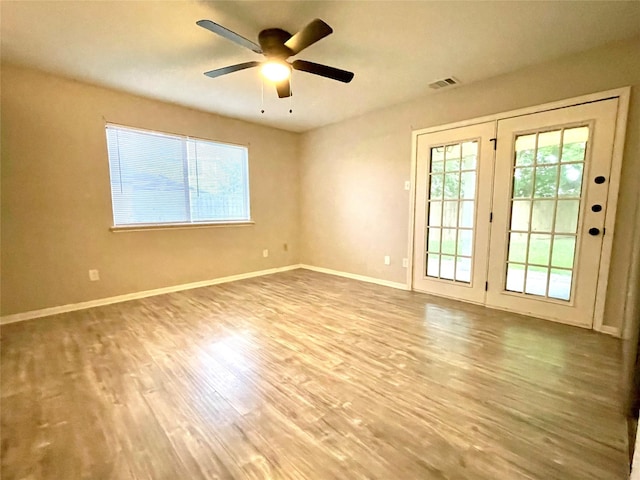 16303 Napa Vine Dr, Houston, TX 77053 - spare room with ceiling fan, wood finished floors, and baseboards