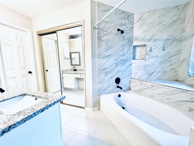 16303 Napa Vine Dr, Houston, TX 77053 - bathroom with vanity, a textured ceiling, and shower / bathtub combination