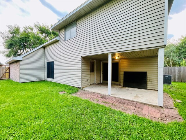 16303 Napa Vine Dr, Houston, TX 77053 - back of property featuring a patio area and central air condition unit
