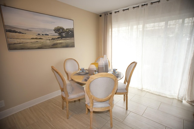 12645 Rip Van Winkle Dr Unit 26, Houston, TX 77024 - dining area with baseboards